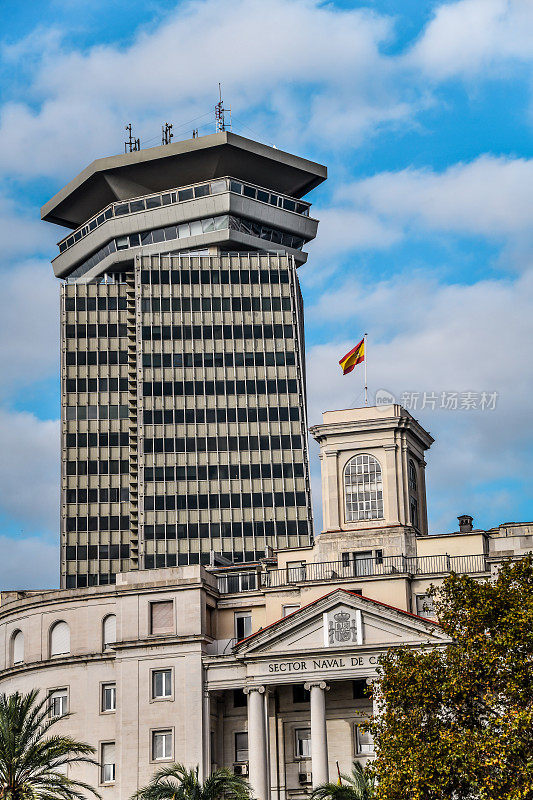 Colón Building Behind Comandancia Naval In Barcelona, Spain